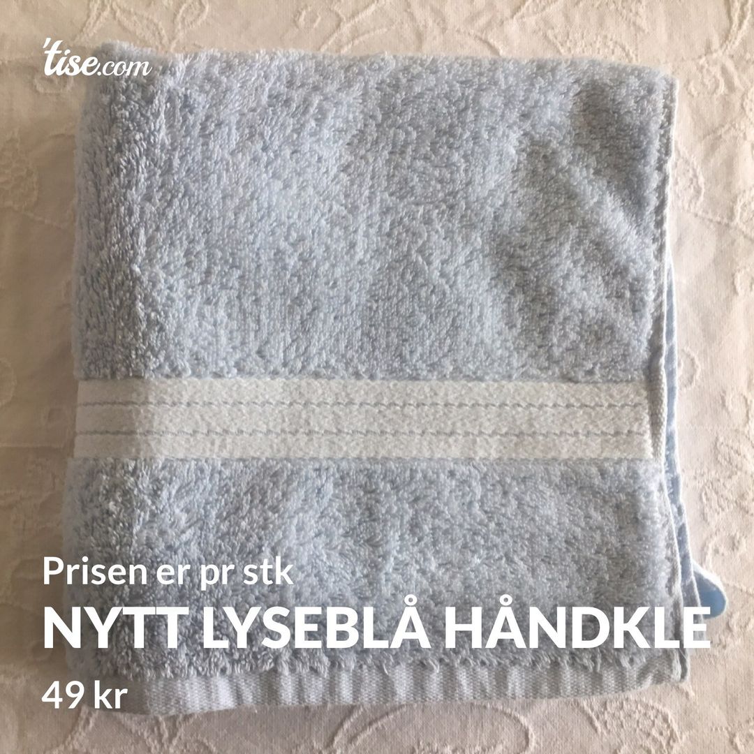 Nytt lyseblå håndkle