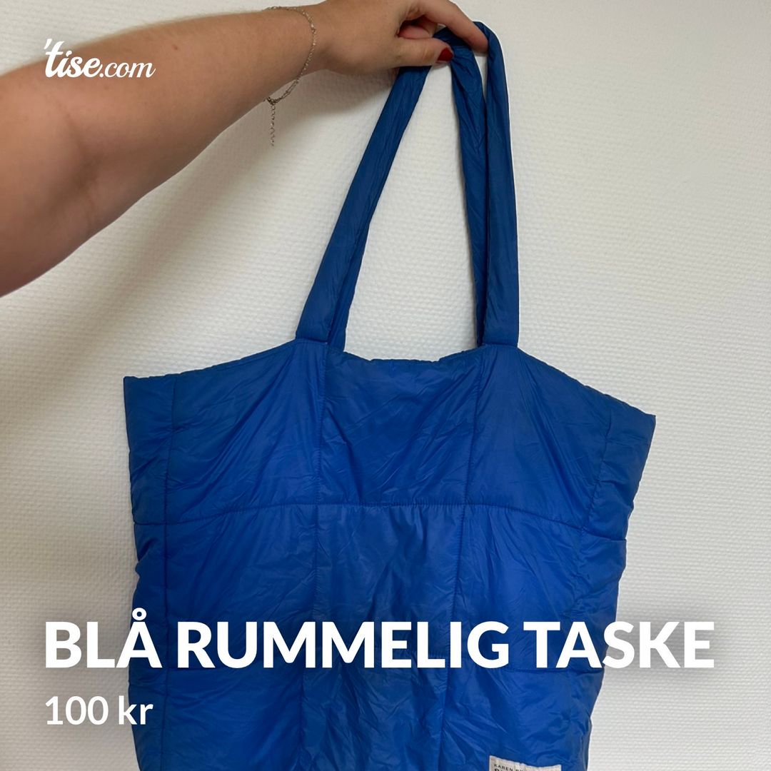 Blå rummelig taske