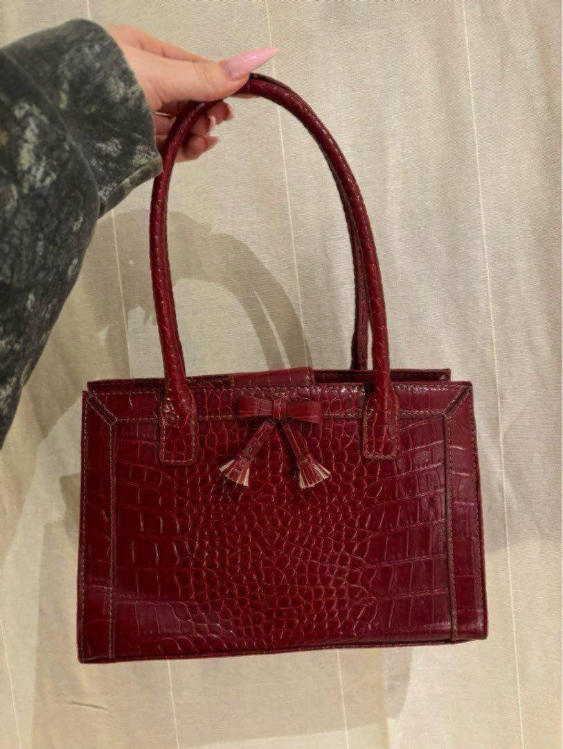 red leather bag