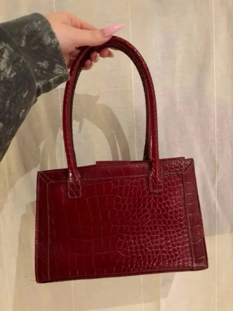 red leather bag