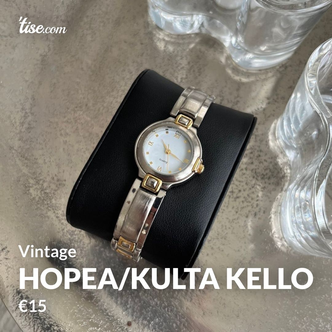 Hopea/kulta kello