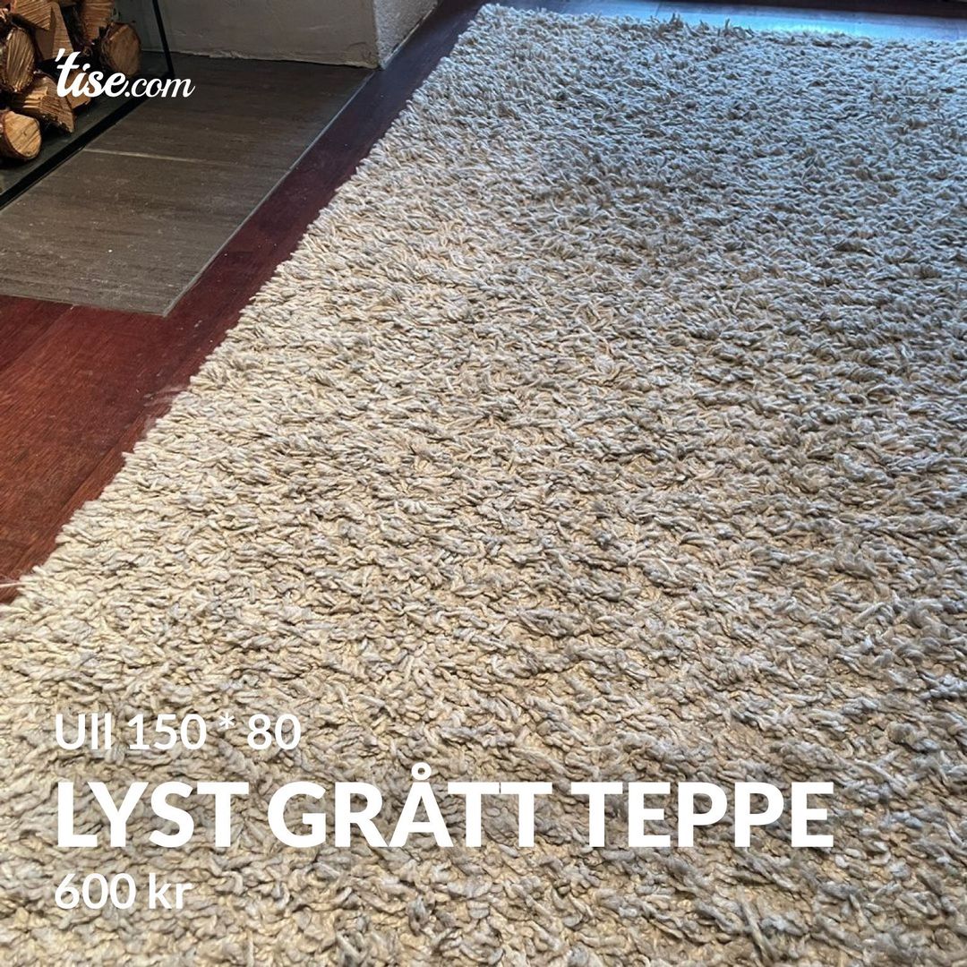 Lyst grått teppe