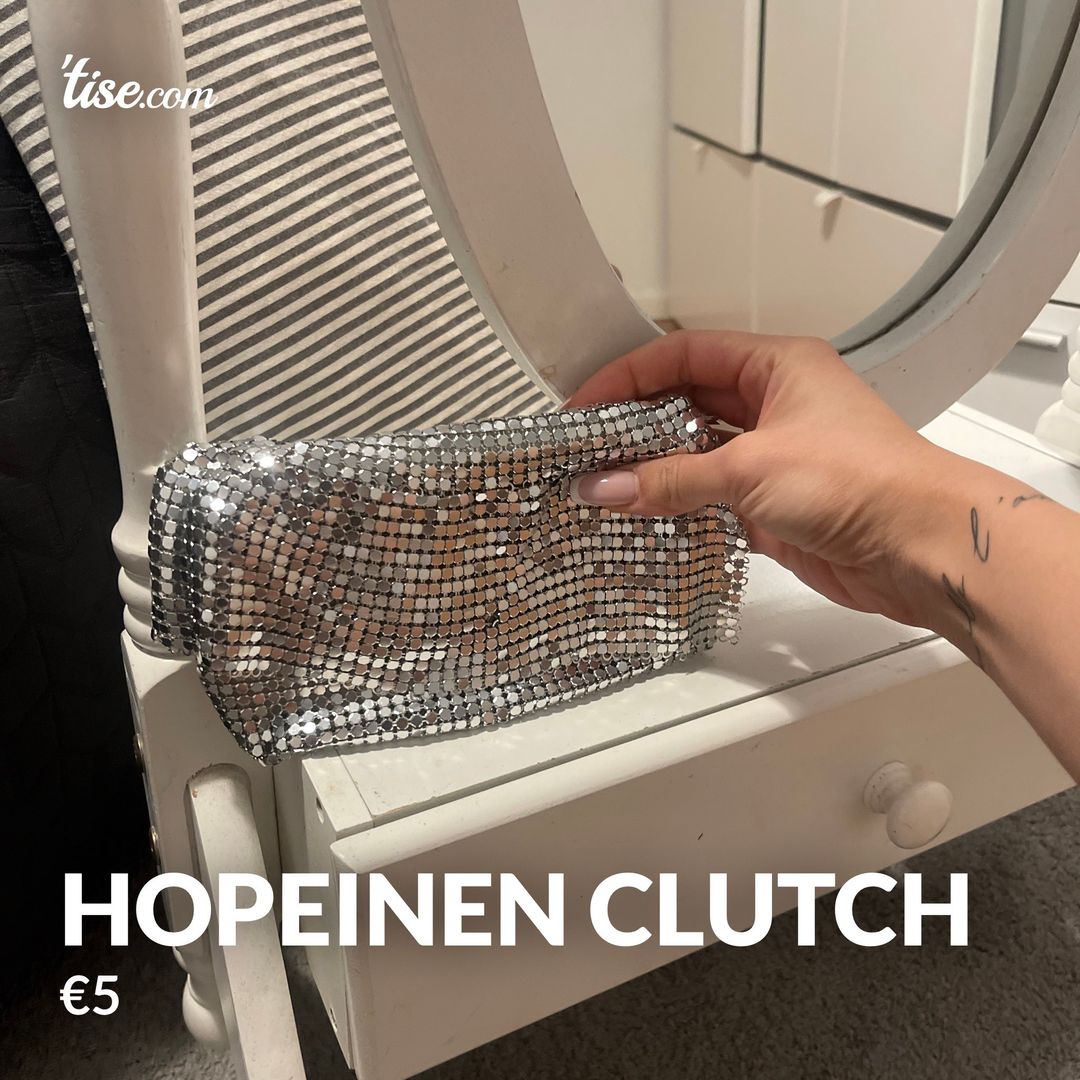 Hopeinen clutch