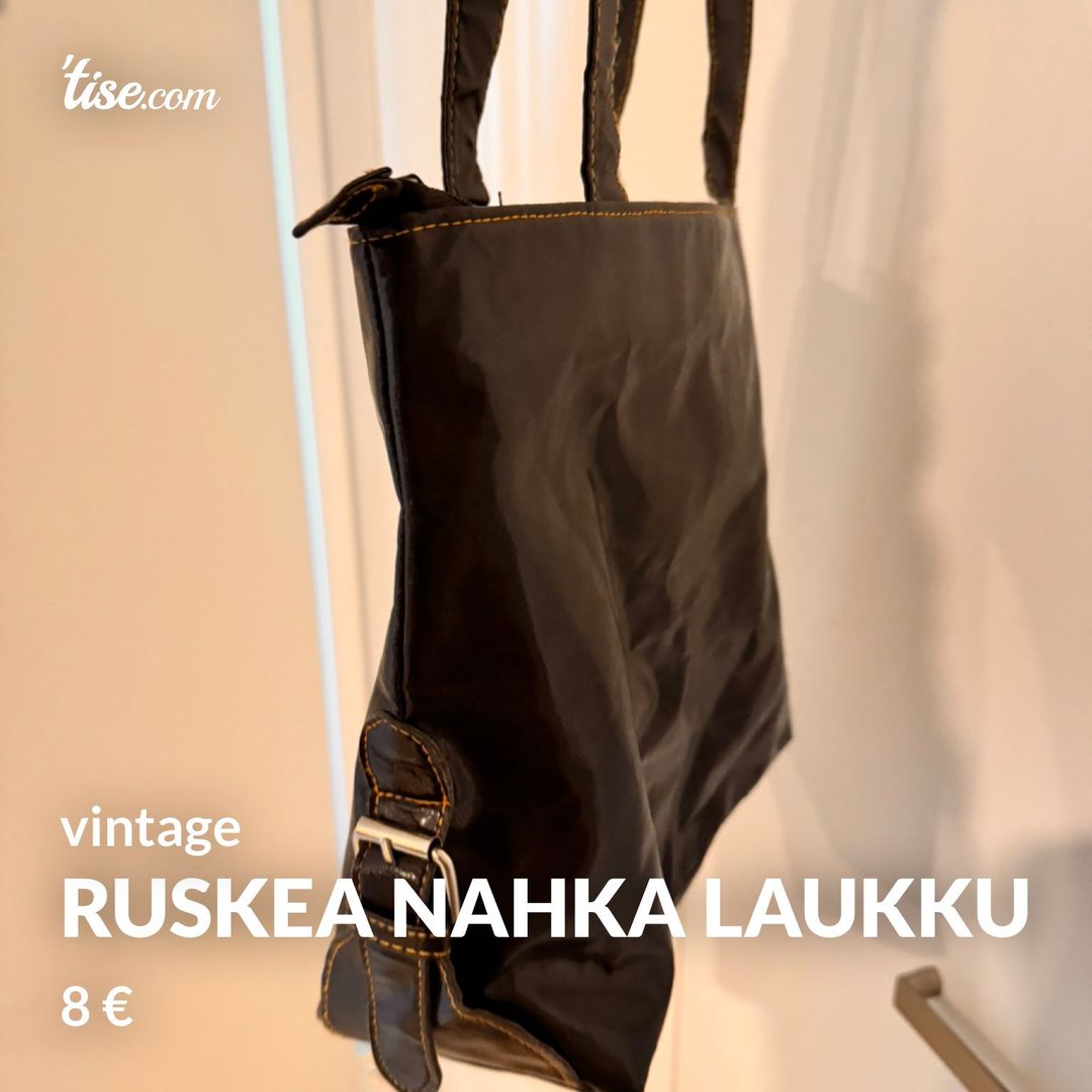 ruskea nahka laukku