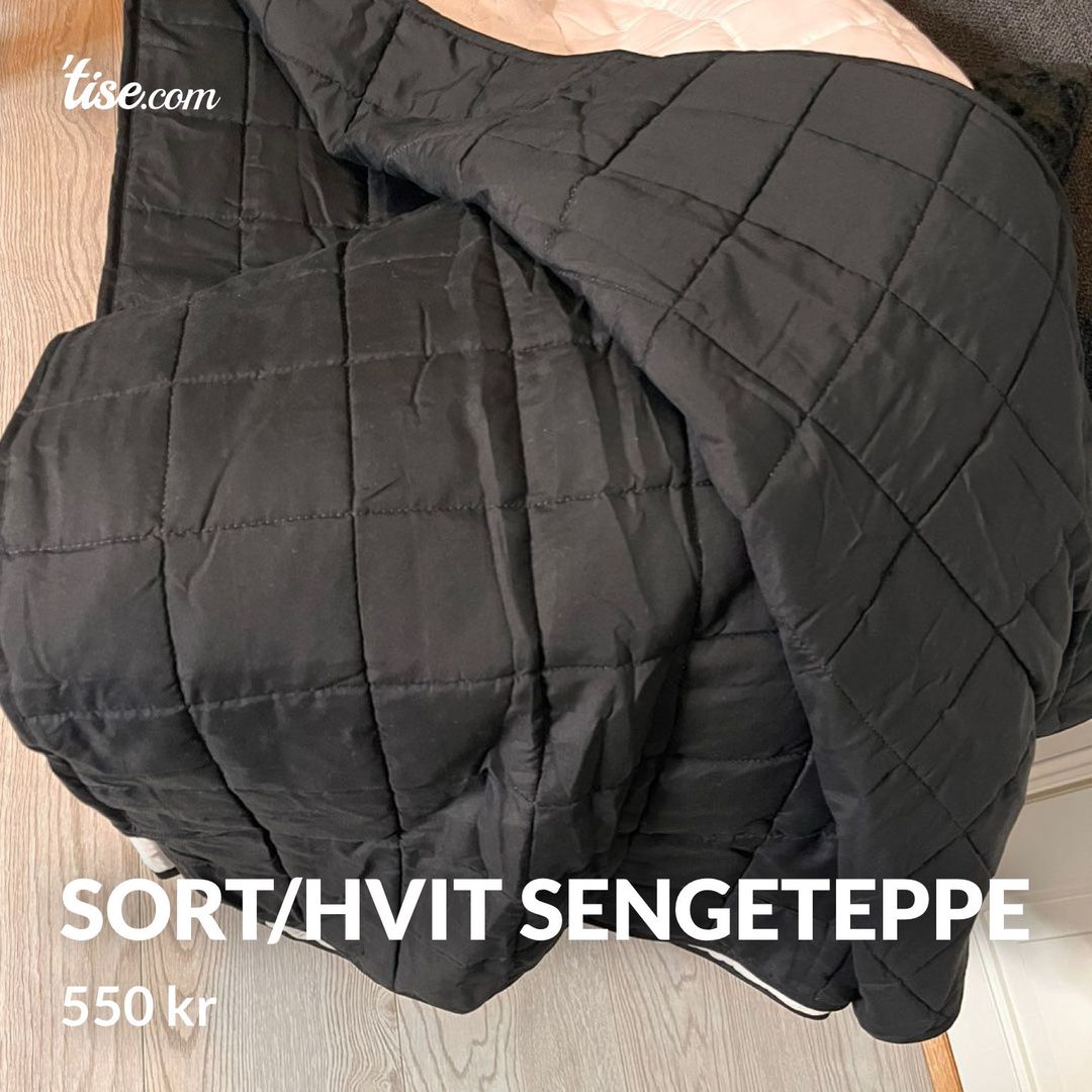 Sort/hvit sengeteppe