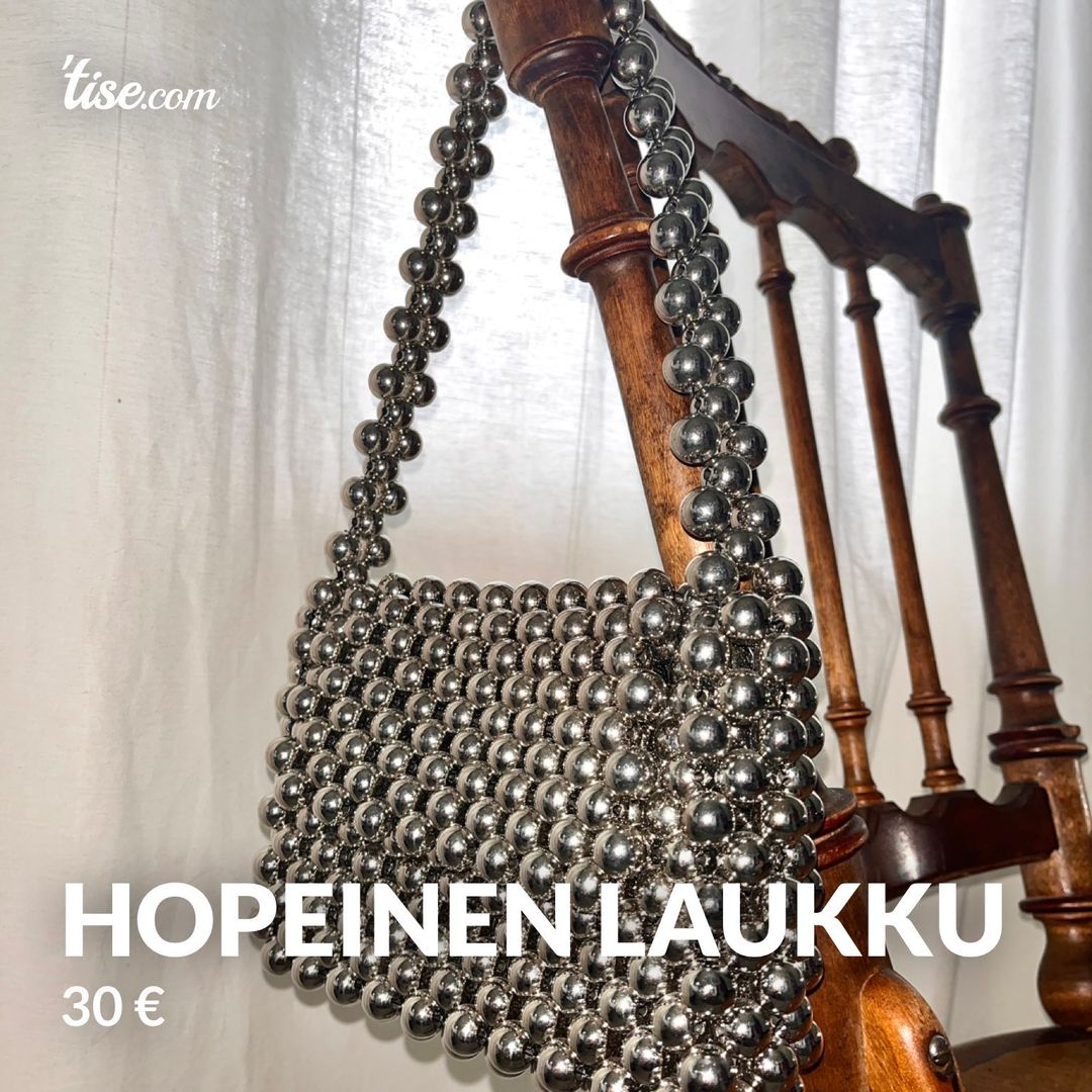 hopeinen laukku