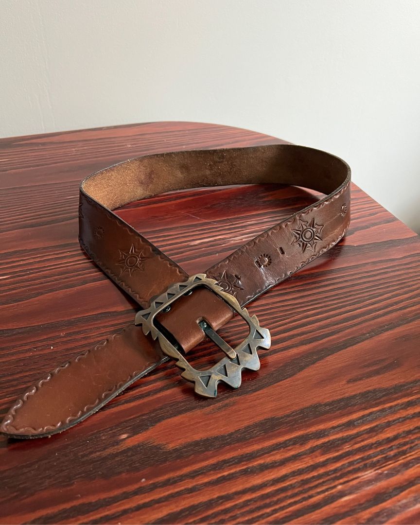 Carved leather belt