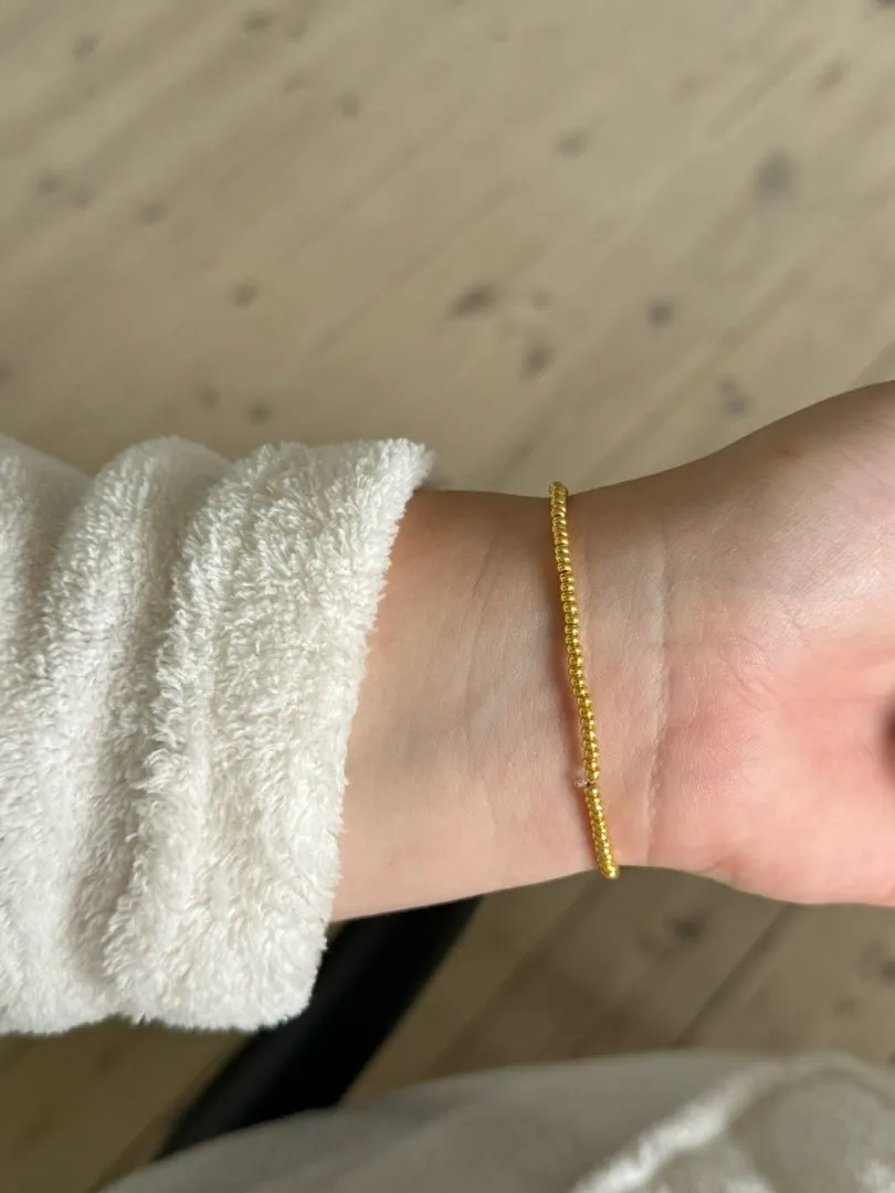 Guld armbånd