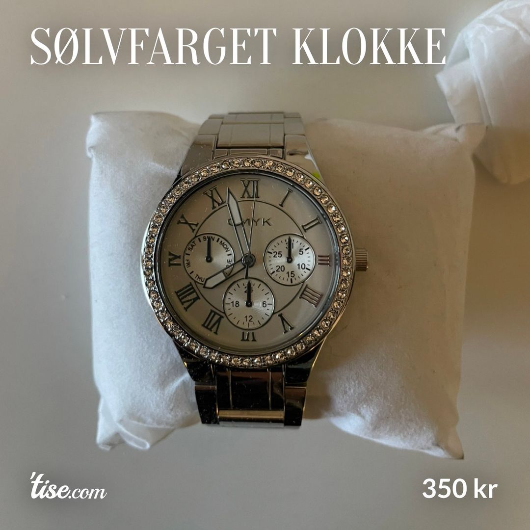 Sølvfarget klokke