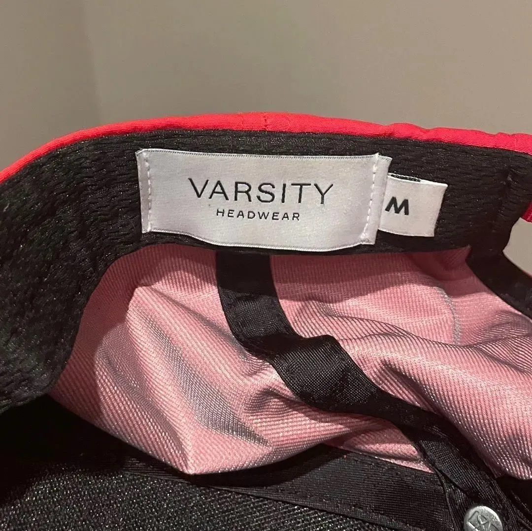 Varsity caps