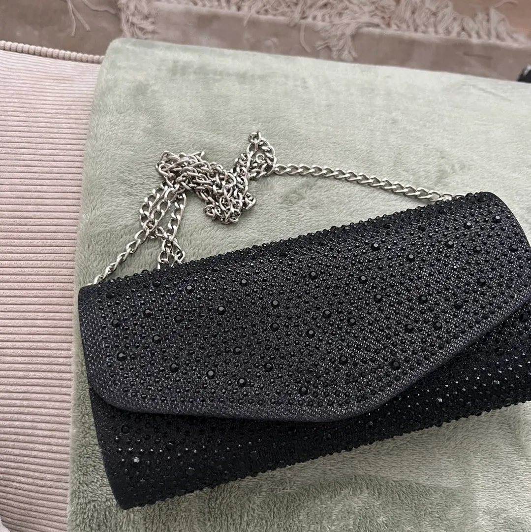 Svart clutch