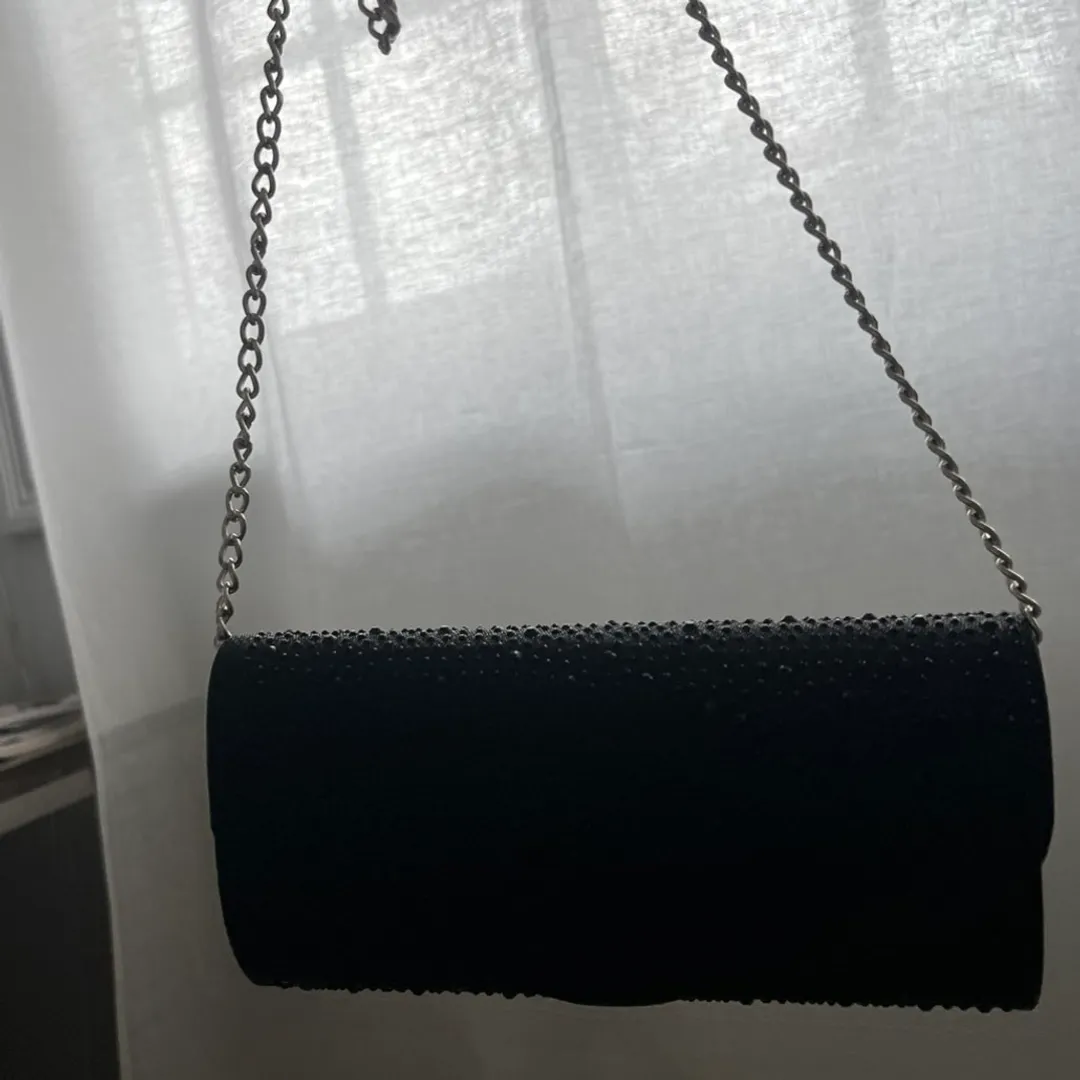 Svart clutch