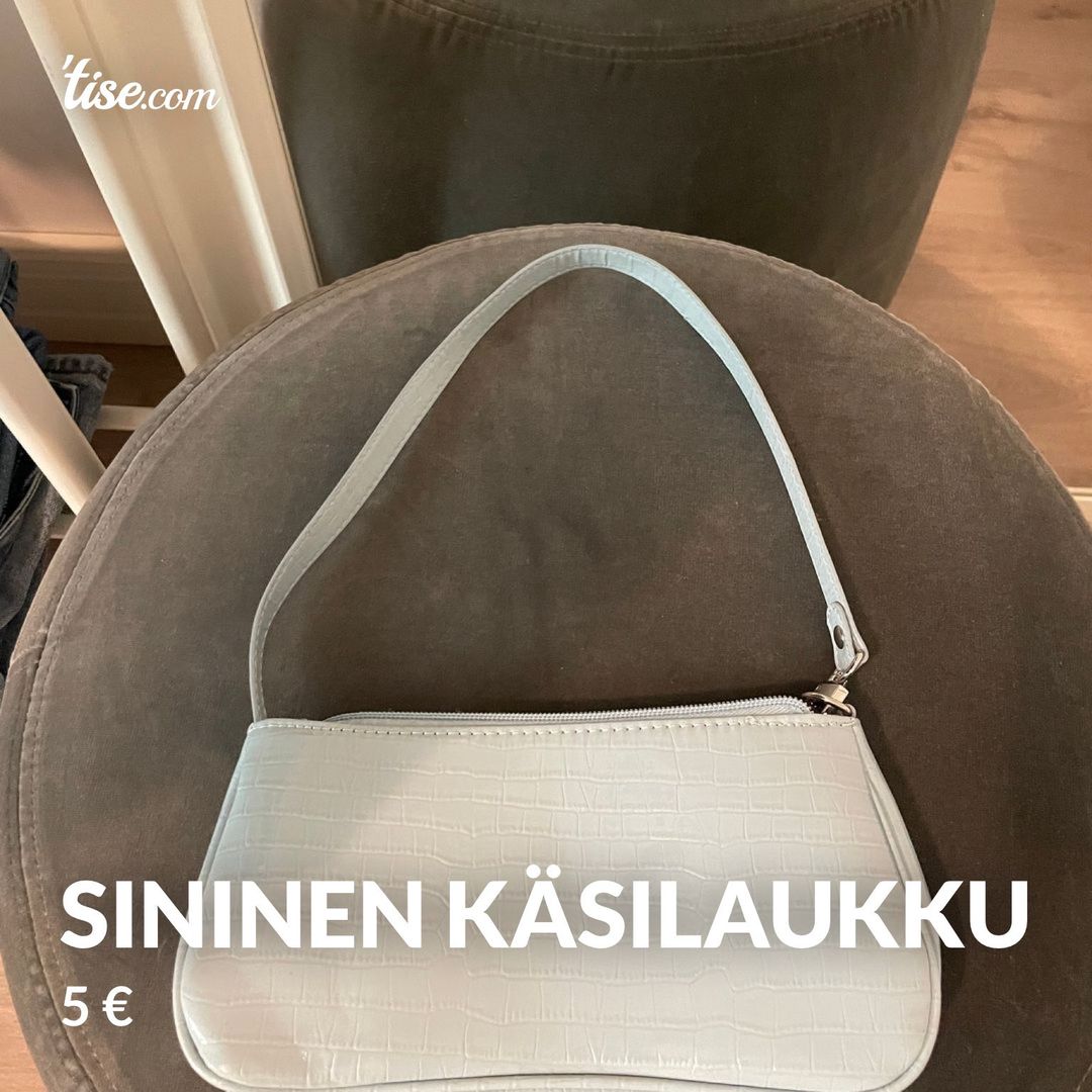 Sininen käsilaukku