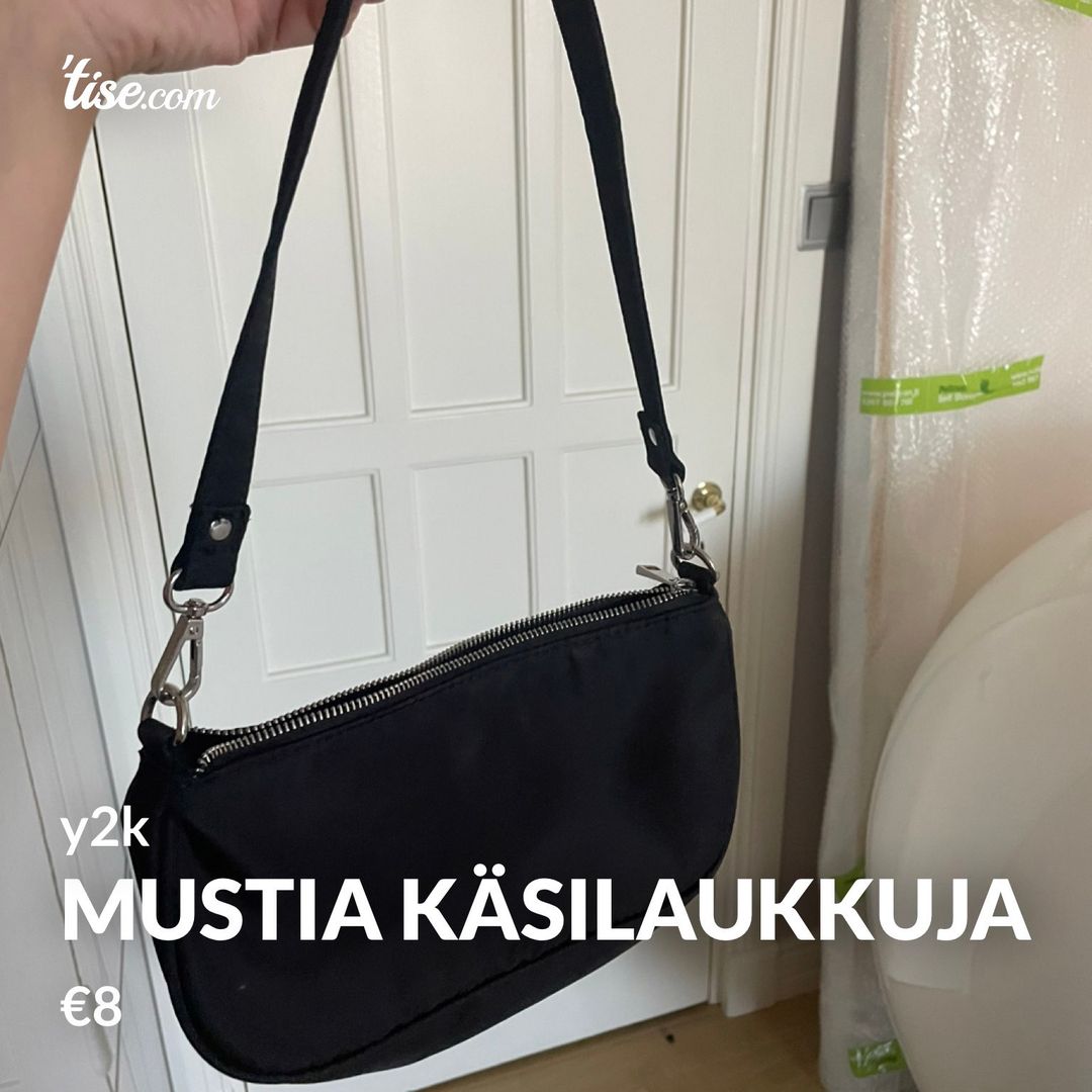 Mustia käsilaukkuja