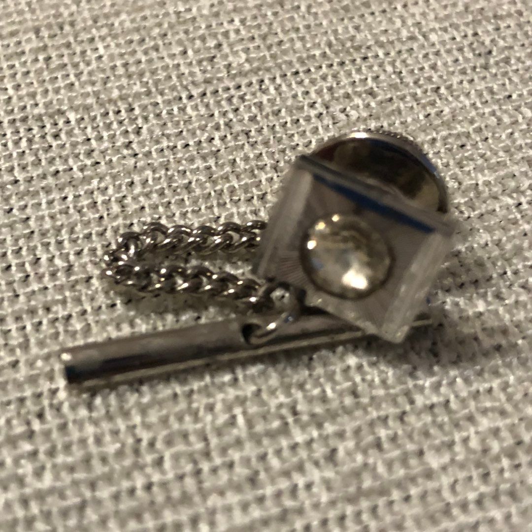 Tie pin tack