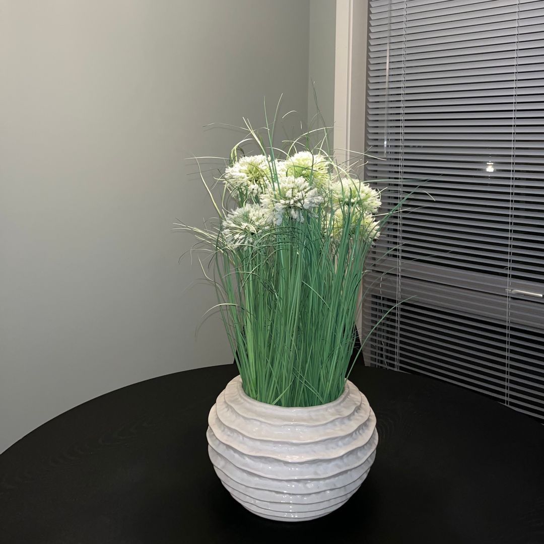 Vase og blomster