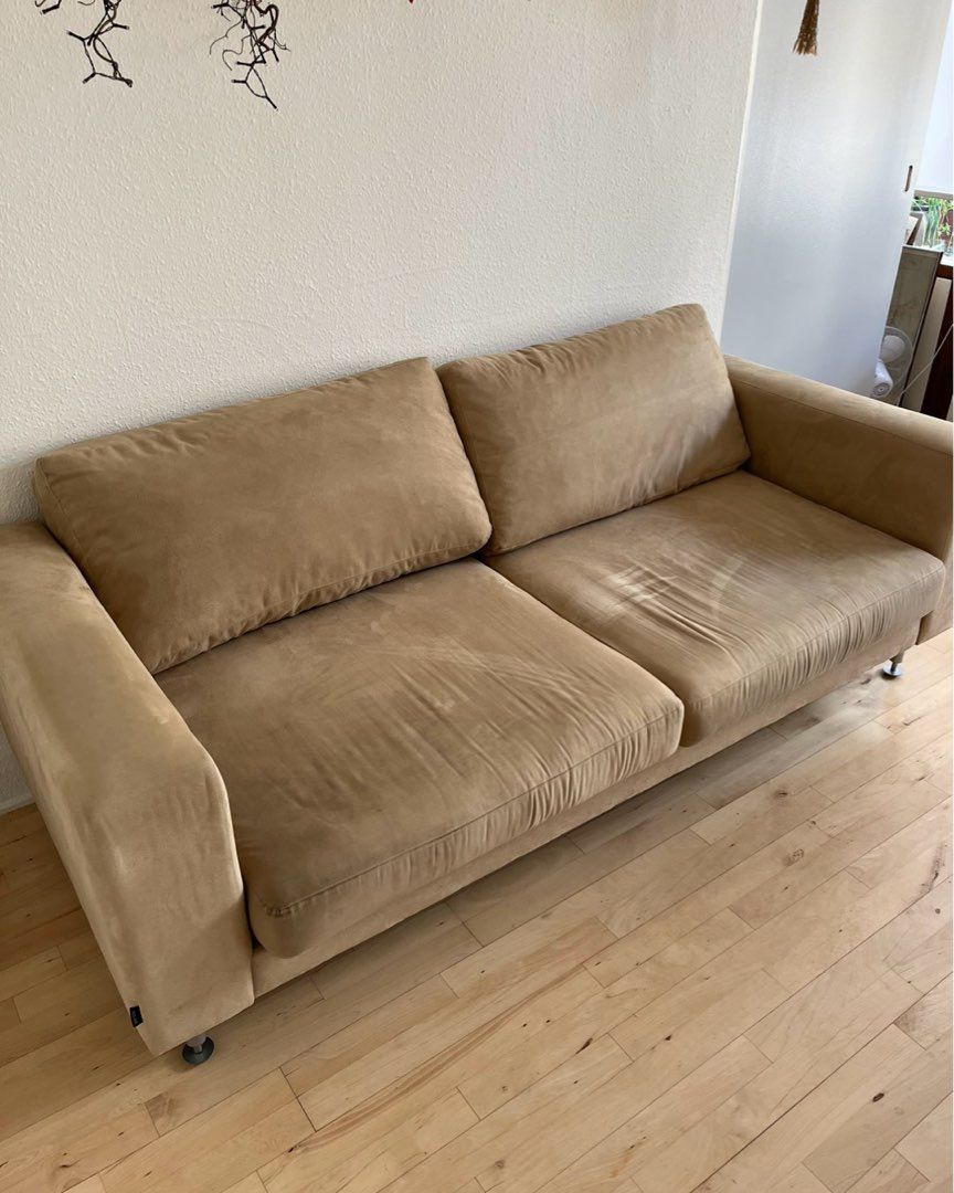 Beige velour sofa