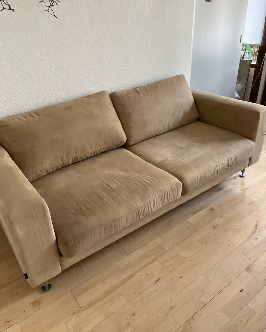 Beige velour sofa