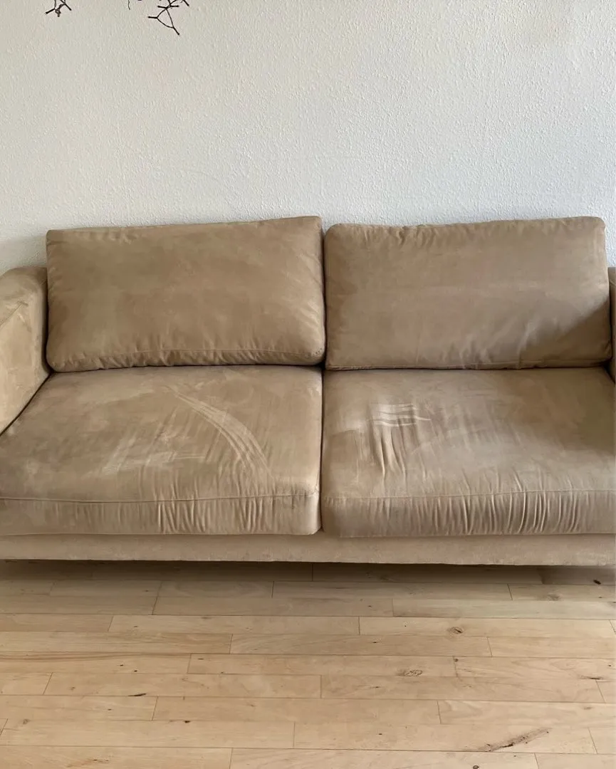 Beige velour sofa