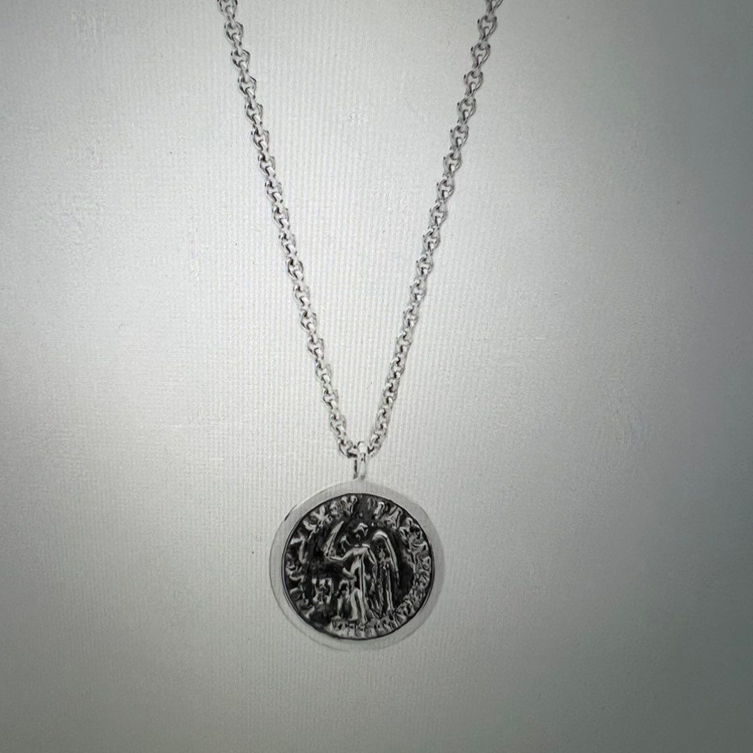 Coin pendant angel