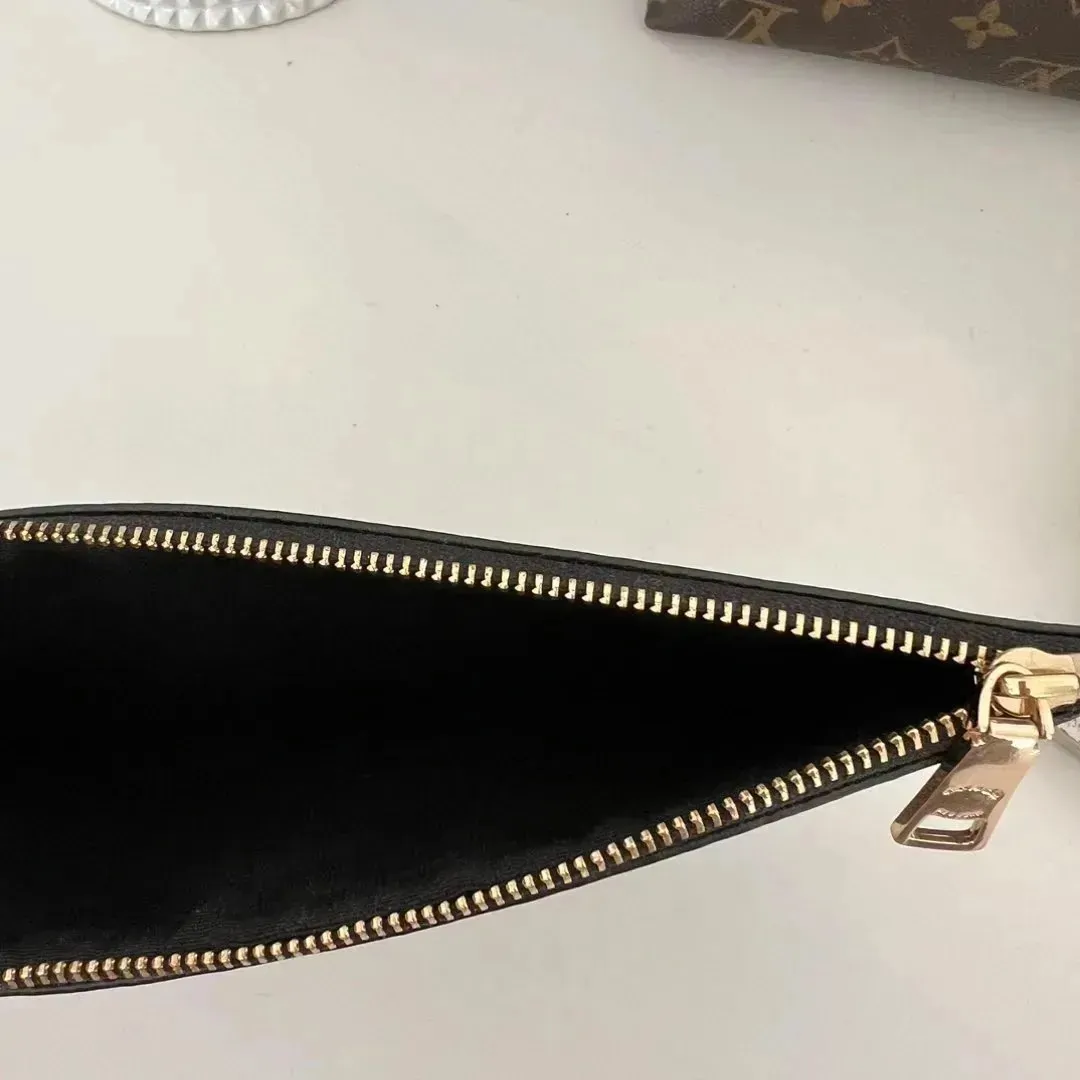 Pochette Coach