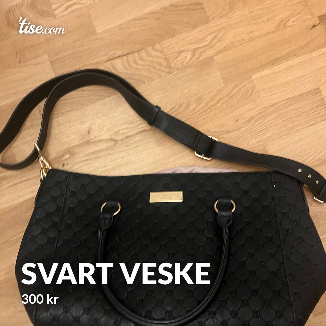 svart veske