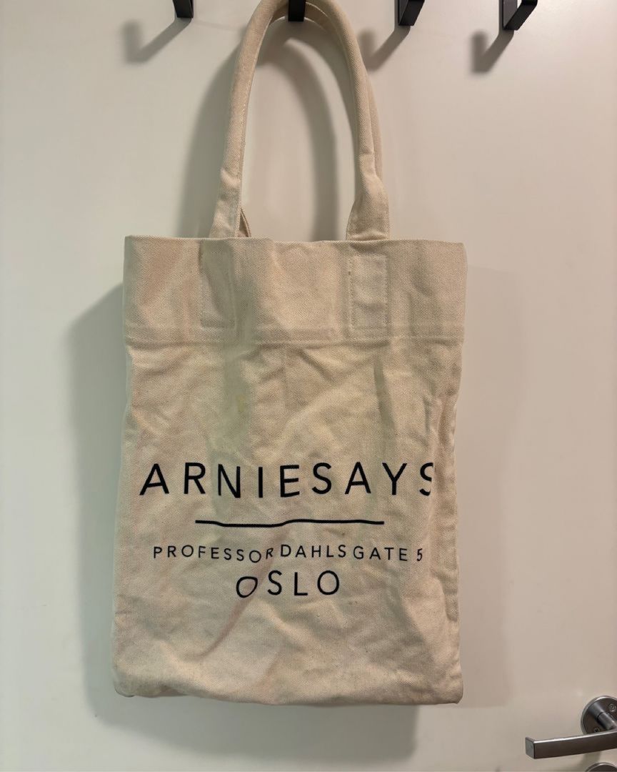 Arniesays tote bag