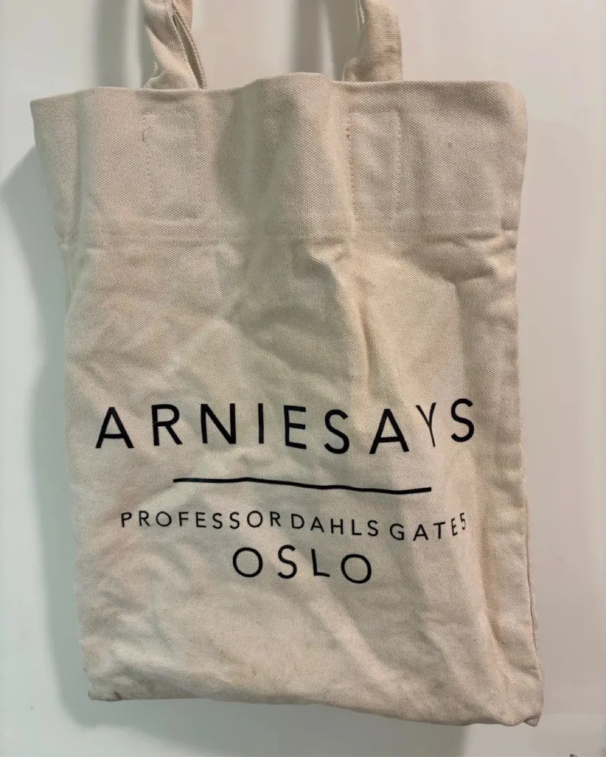 Arniesays tote bag