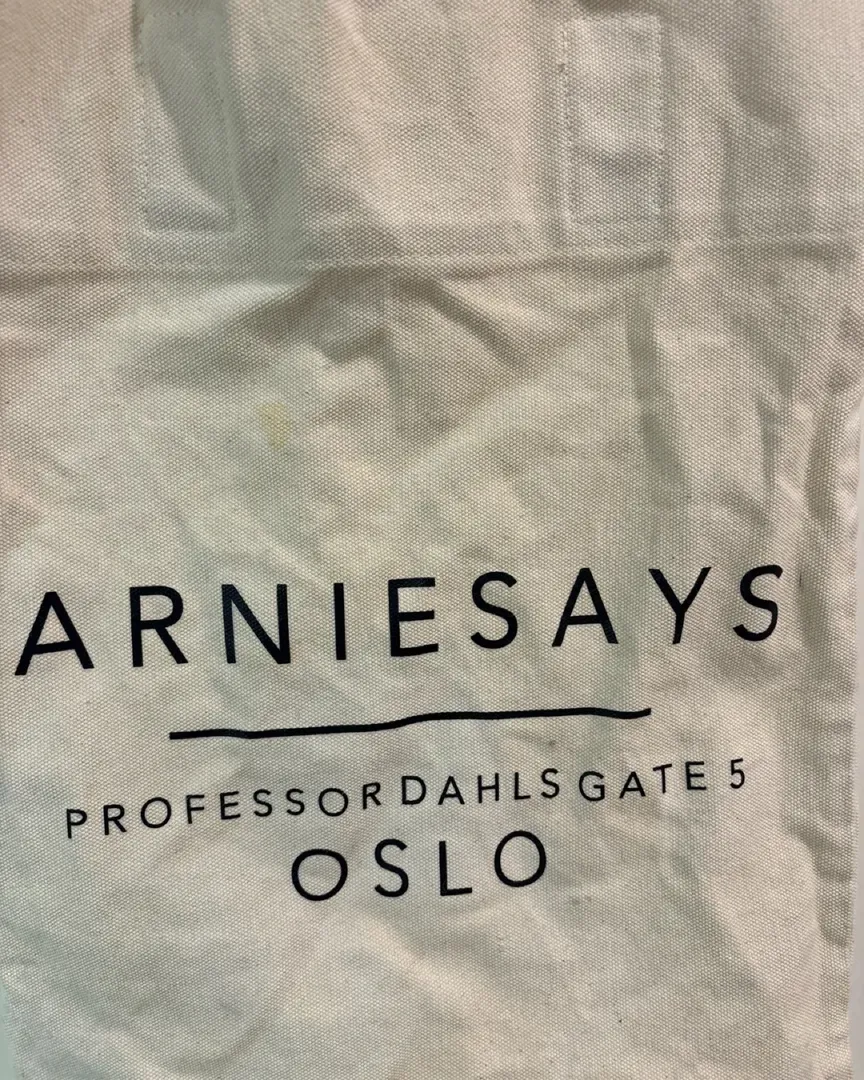 Arniesays tote bag