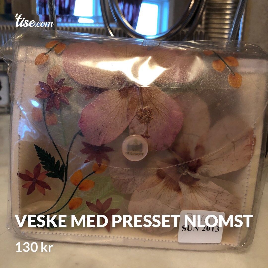 Veske med presset nlomst