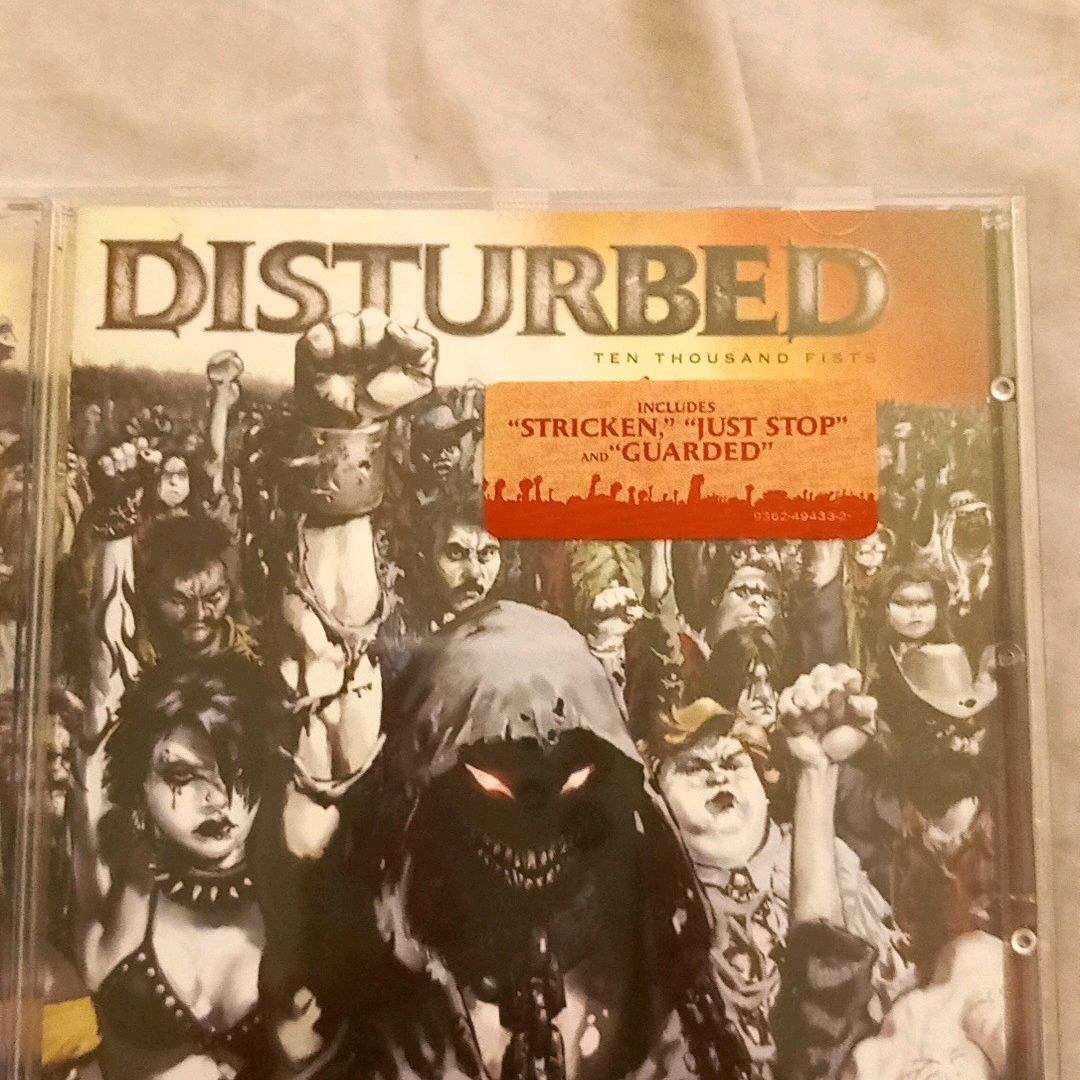 Disturbed CD Levy