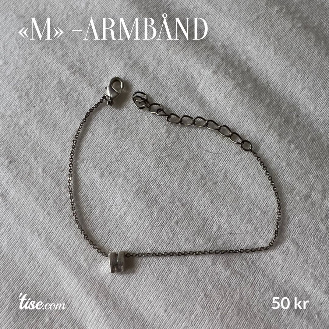 «M» -Armbånd