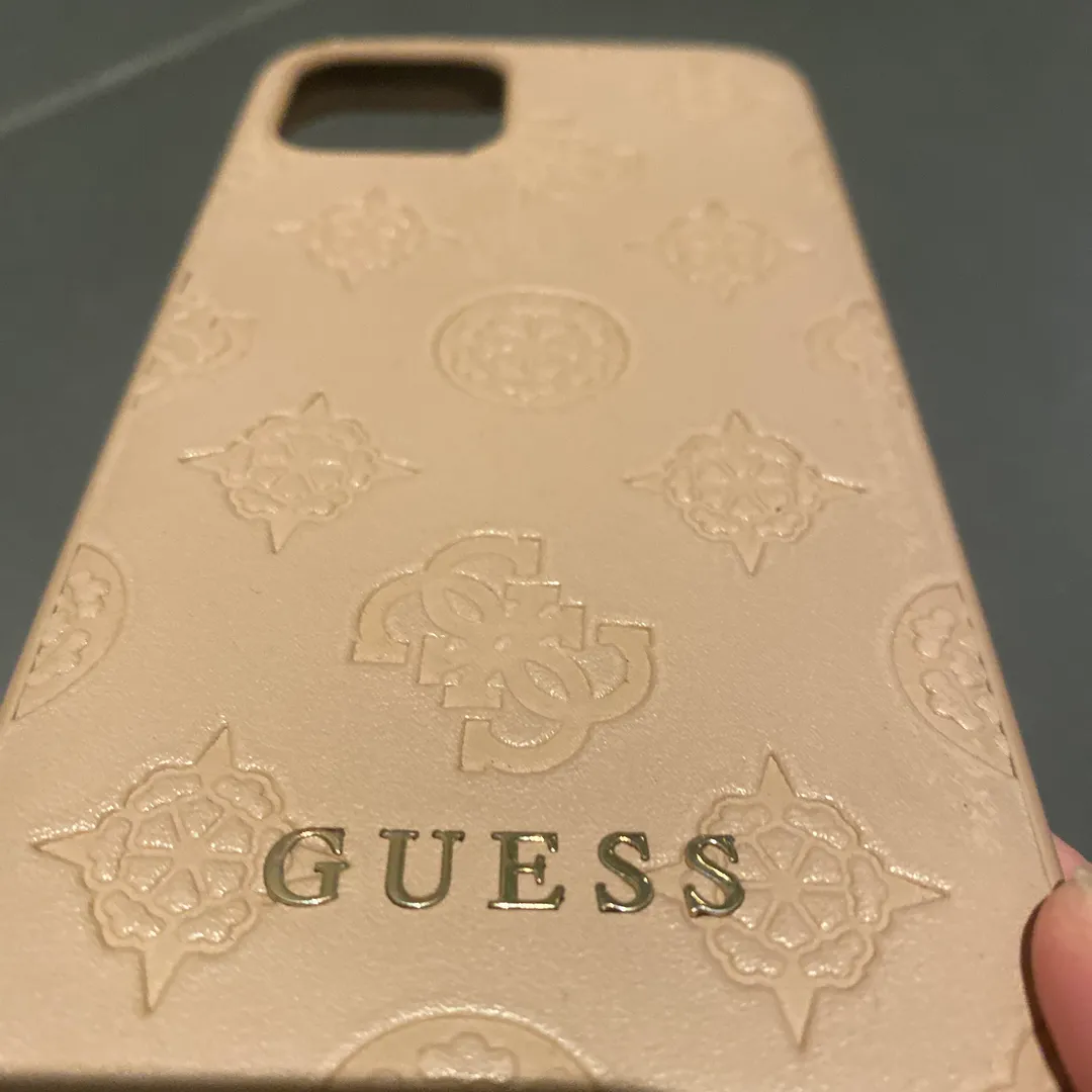 GUESS deksel