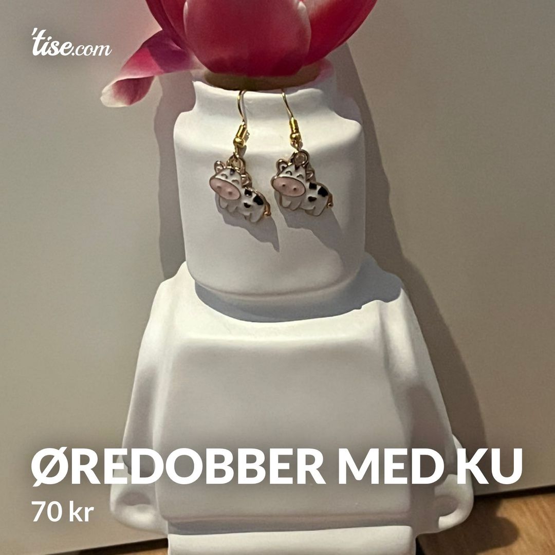 Øredobber med ku