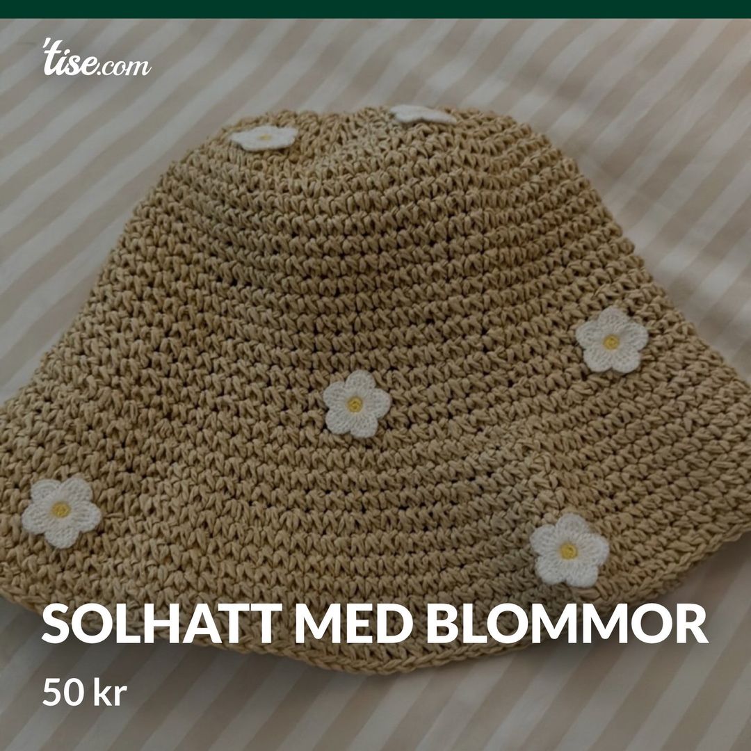 Solhatt med blommor