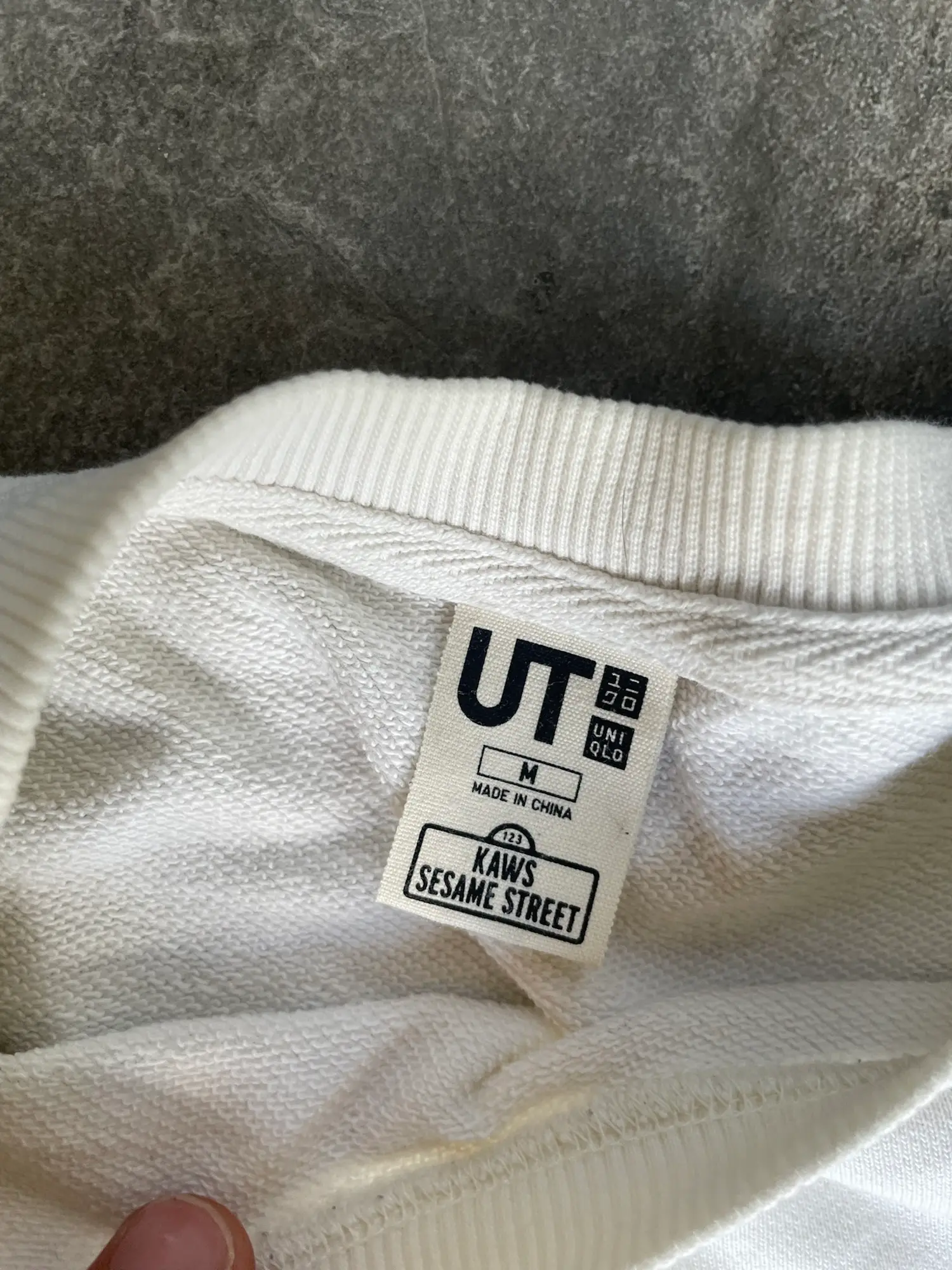 KAWS x Uniqlo sweatshirt