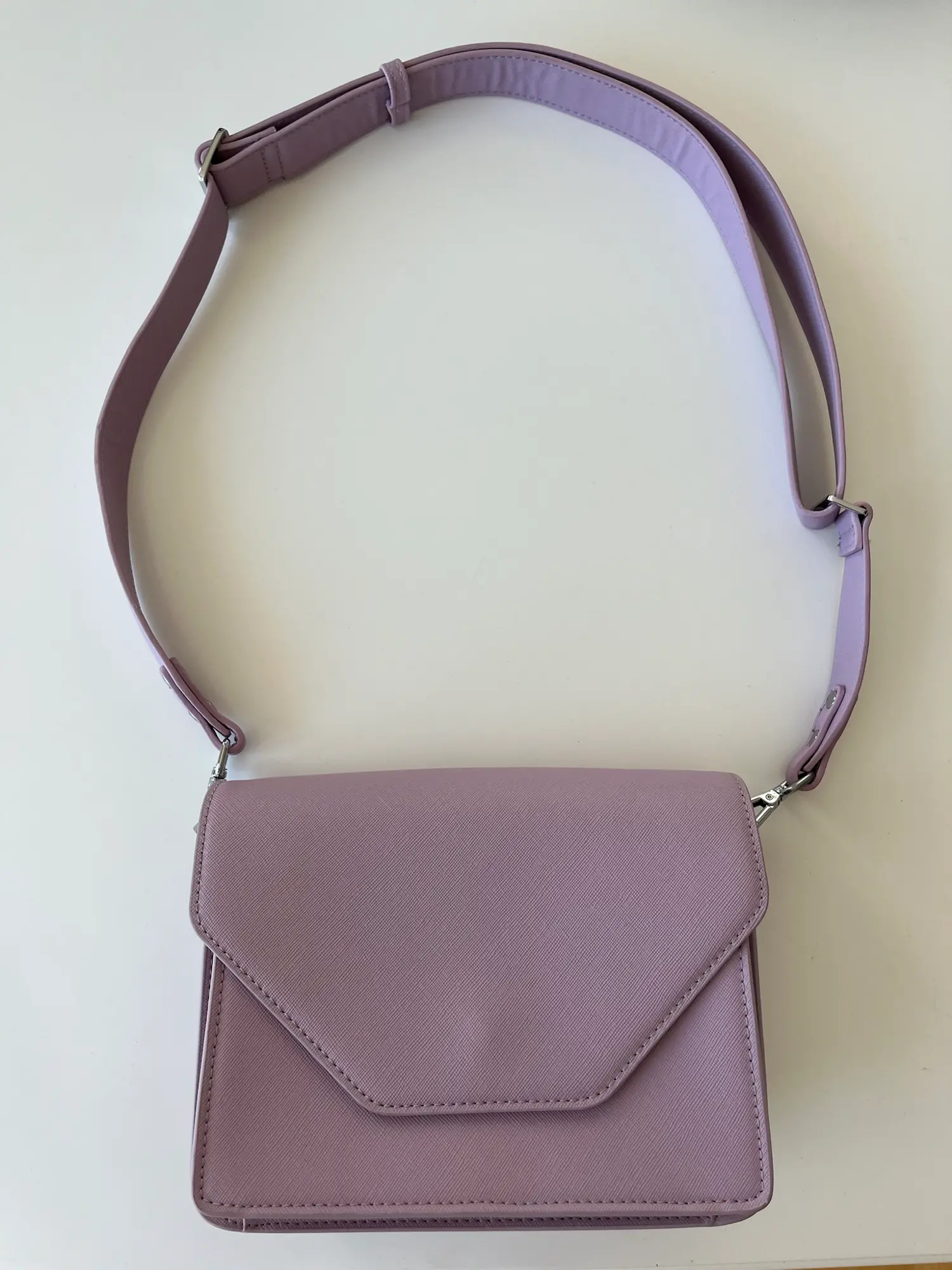 Unlimit crossbody-taske