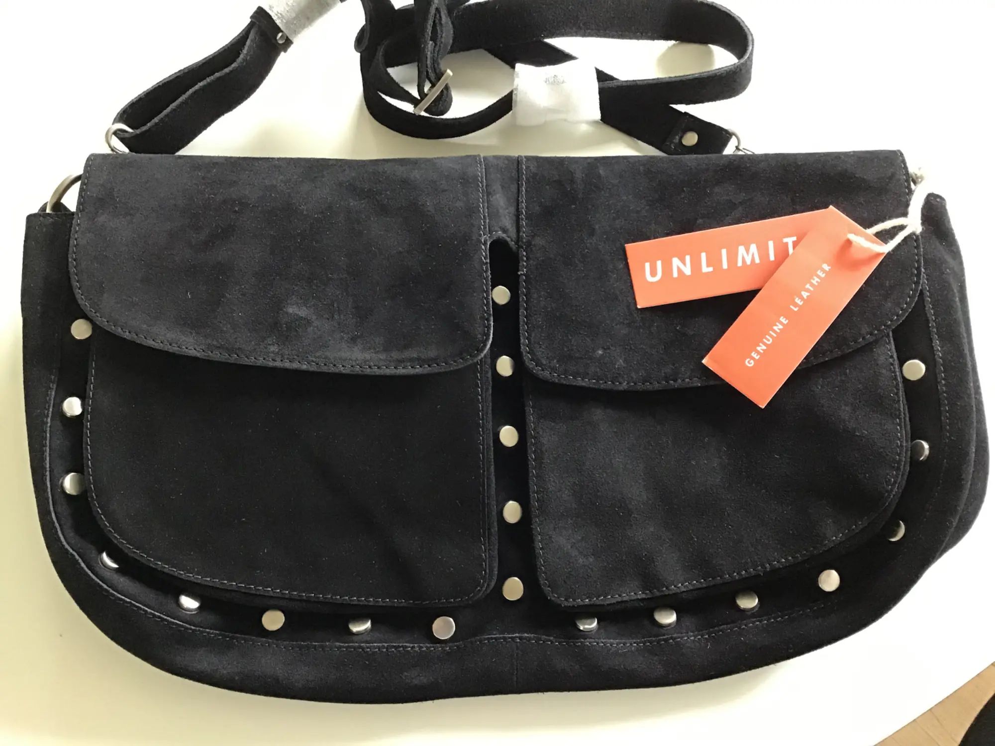 Unlimit crossbody-taske