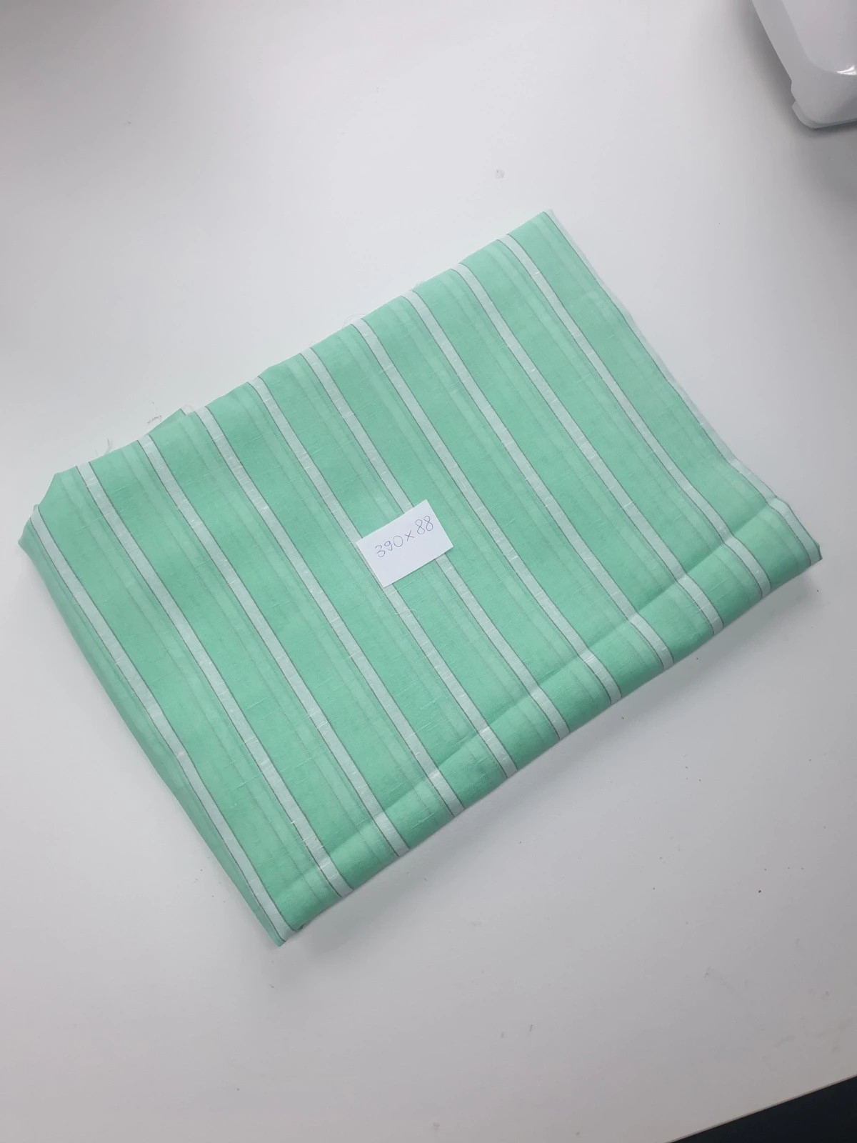 Bawełniany batyst zielony miętowy w paski tkanina