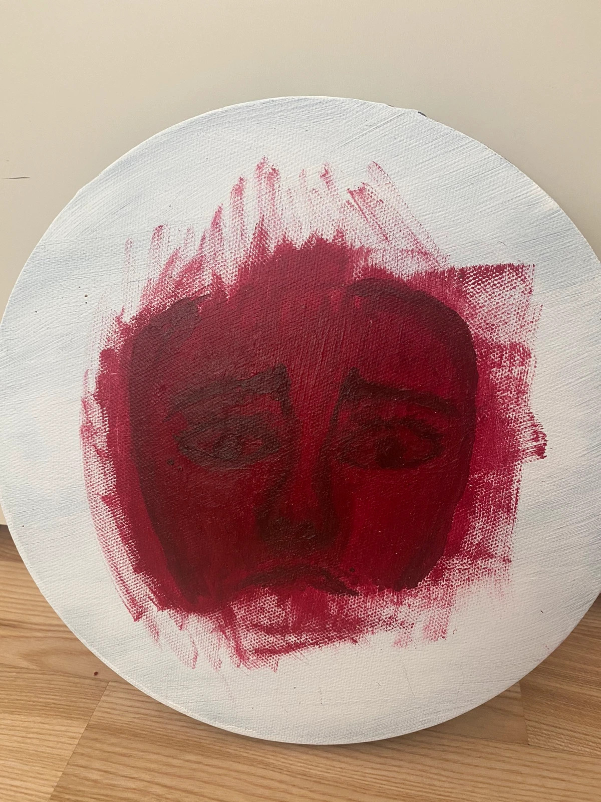 Round painting of woman face