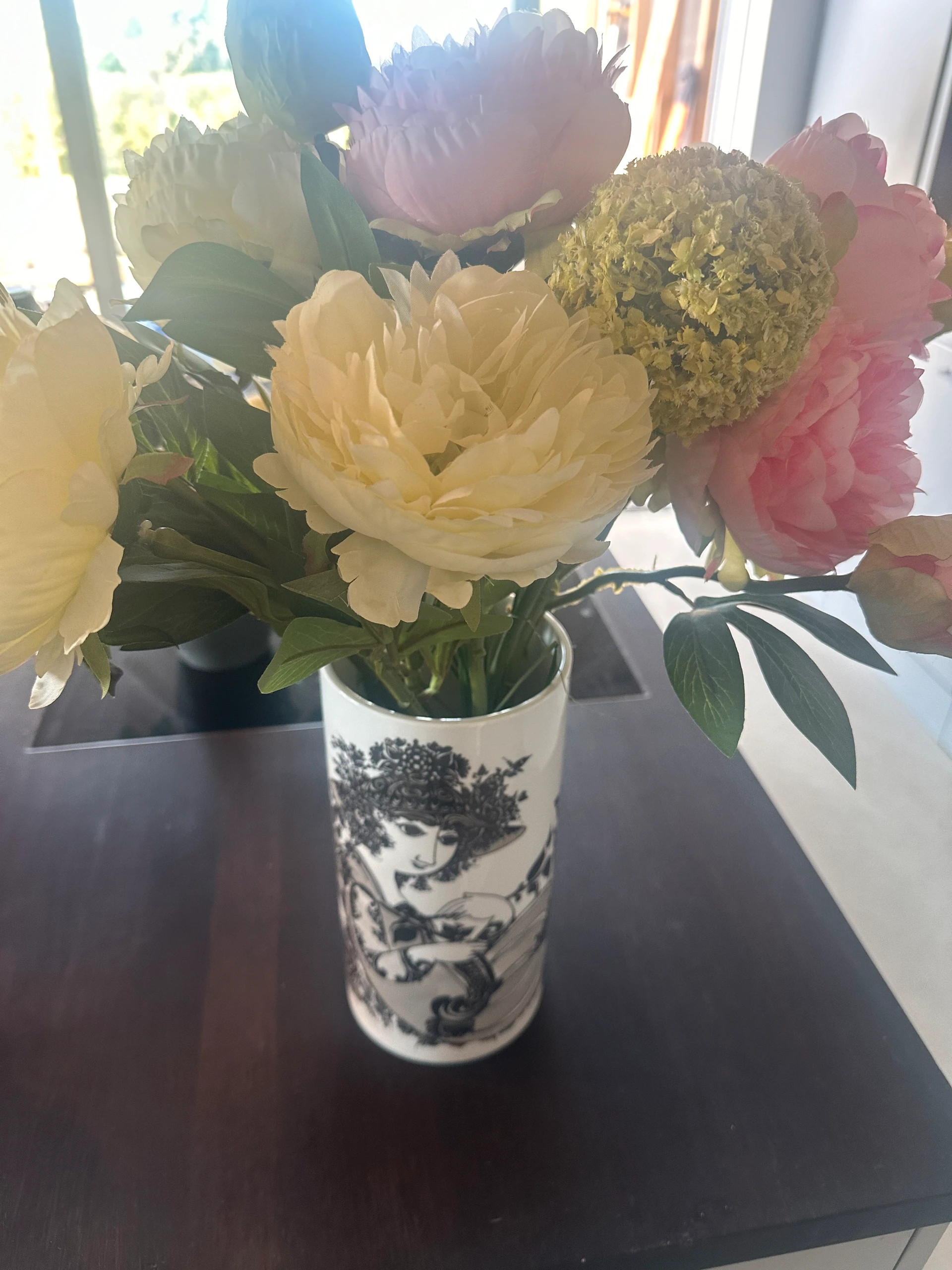 Vase og blomster