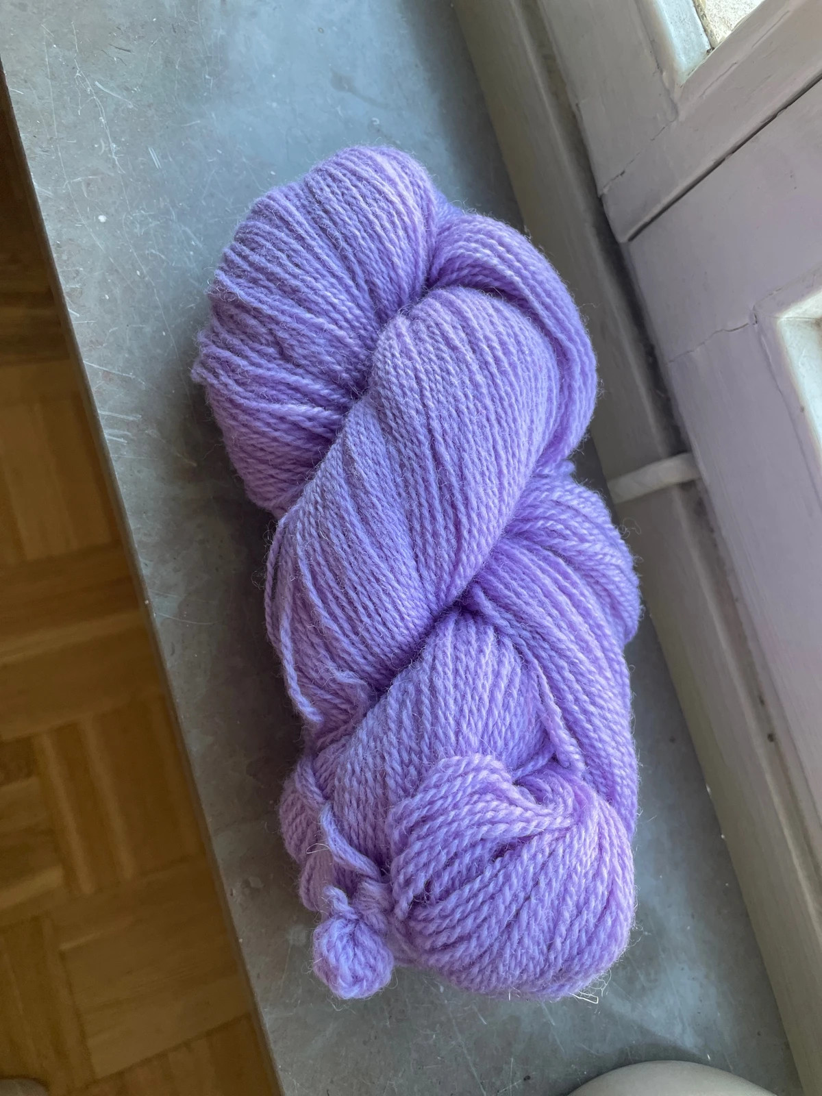 100 grams of lilac yarn