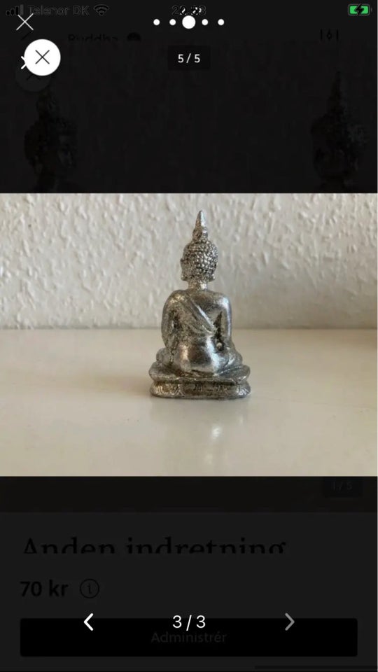 Sølvfarvet Buddha skulptur