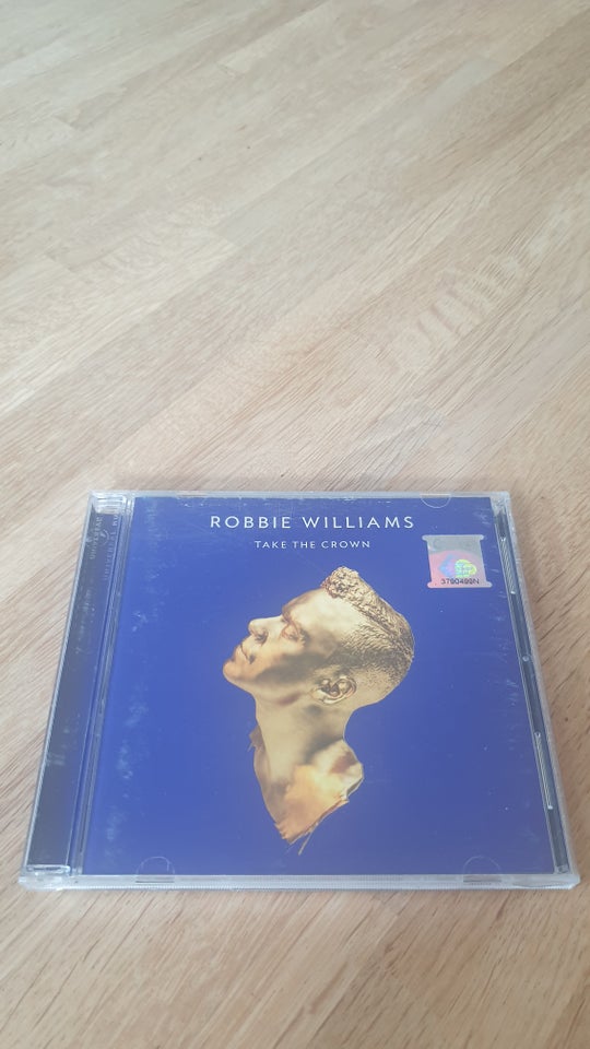 ROBBIE WILLIAMS: TAKE THE CROWN,