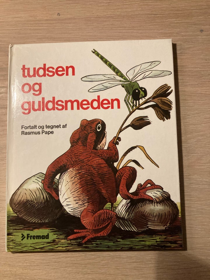 Tudsen og guldsmedjen, M