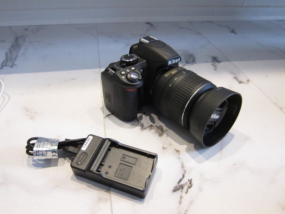 Nikon D3100, 14.2 megapixels, 3 x