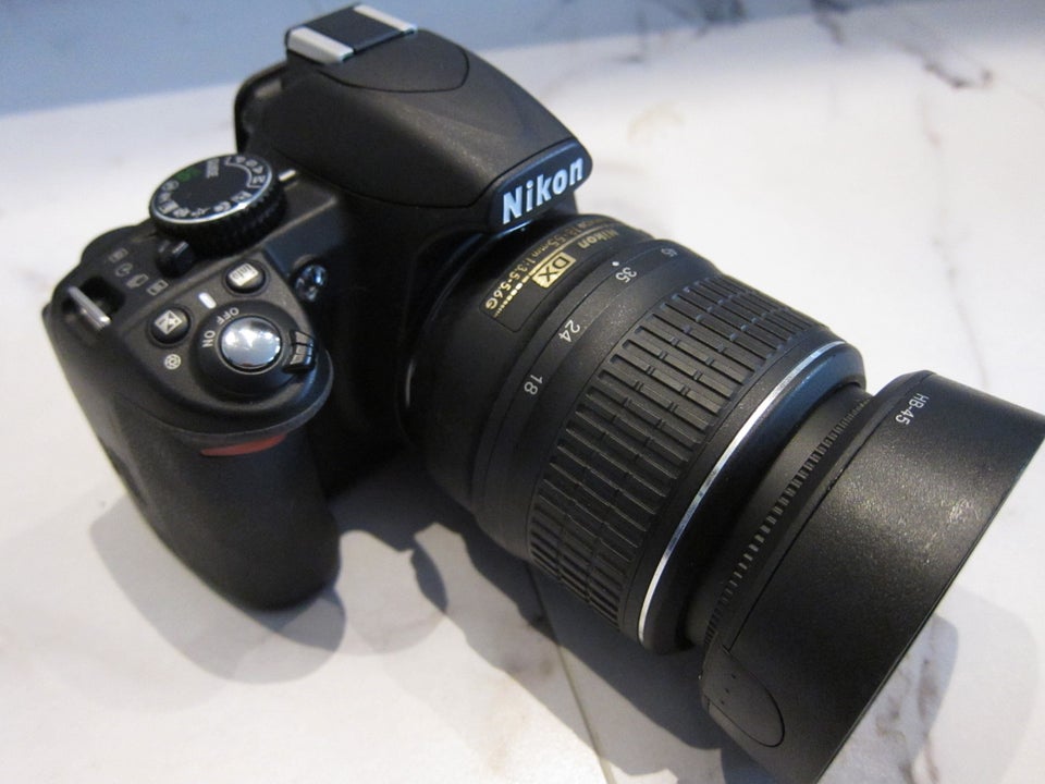 Nikon D3100, 14.2 megapixels, 3 x