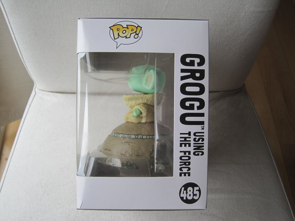 Funko Pop #485 Grogu using the