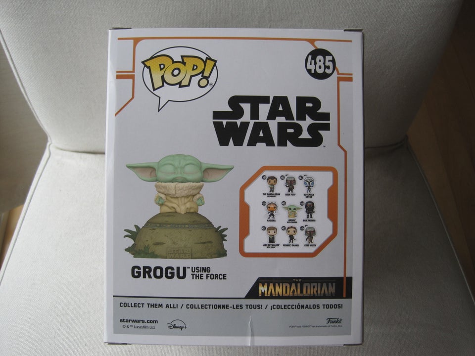 Funko Pop #485 Grogu using the