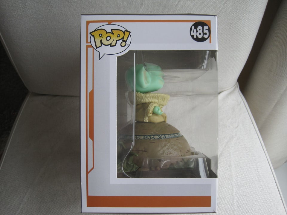 Funko Pop #485 Grogu using the